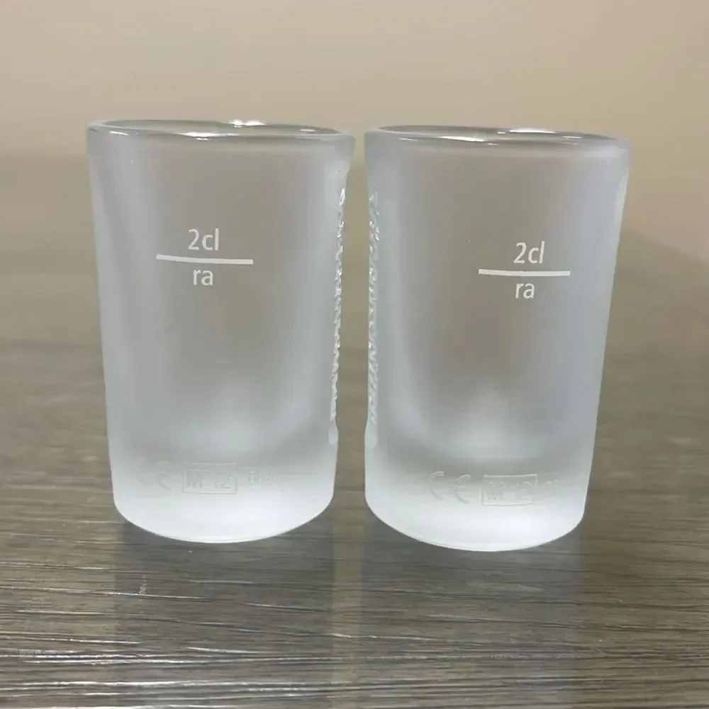 Pair of Embossed Jagermeister Frosted Glass 1 fl. oz Shot Glasses Barware Bar